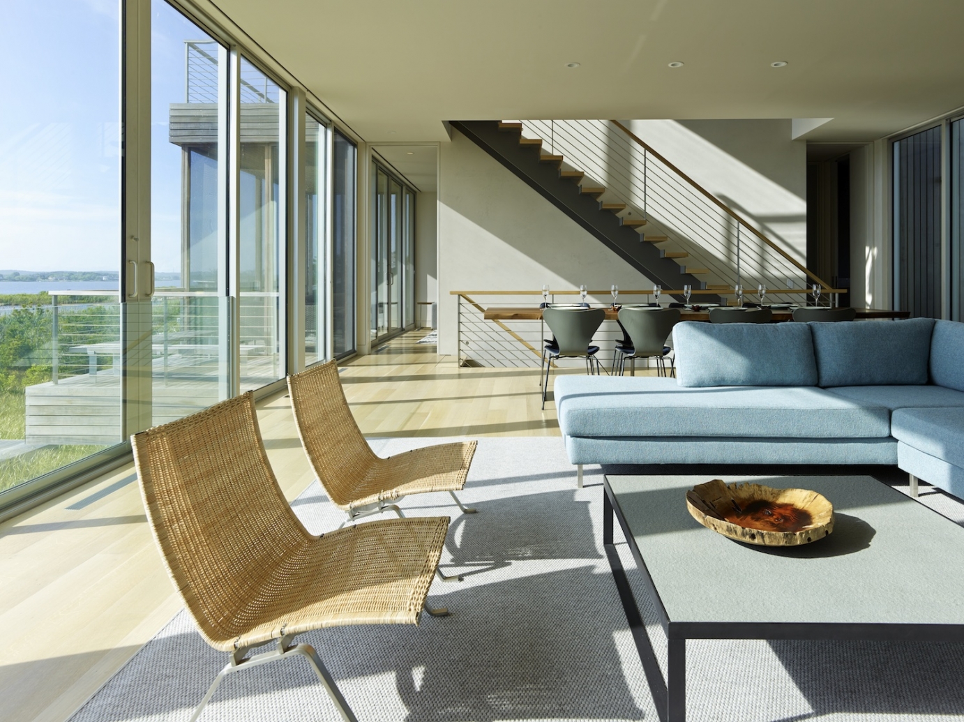 Living room with floating staircase